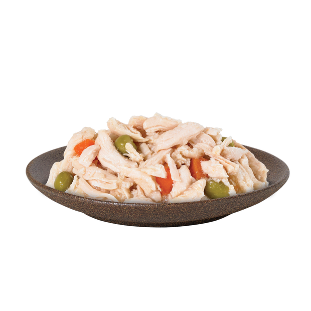 Delicious looking bowl of HiLife its only natural Luxury Chicken Breast with Carrots and Peas in Jelly wet dog food, showing real pieces of chicken breast, carrots and peas, made with 100 percent natural ingredients and 60% meat