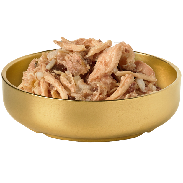 Food shot of a bowl of HiLife Banquet Flaked Chicken with Rice and Tuna Dog Food showing flakes of real chicken, rice and tuna