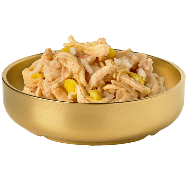 Bowl of HiLife Banquet Flaked Chicken with Rice and Pumpkin Dog Food showing flakes of real chicken, rice and pumpkin